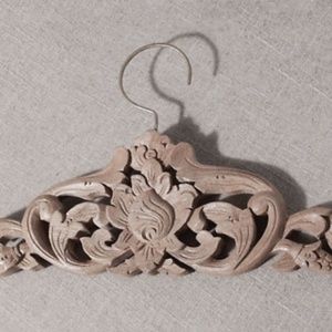 Carved wood hanger